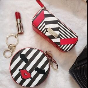 Striped Black and White Round Bag with Red Accents